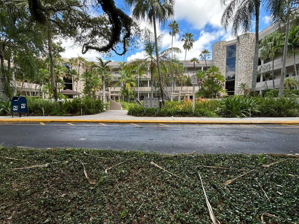 Front parking lot entrance view of building