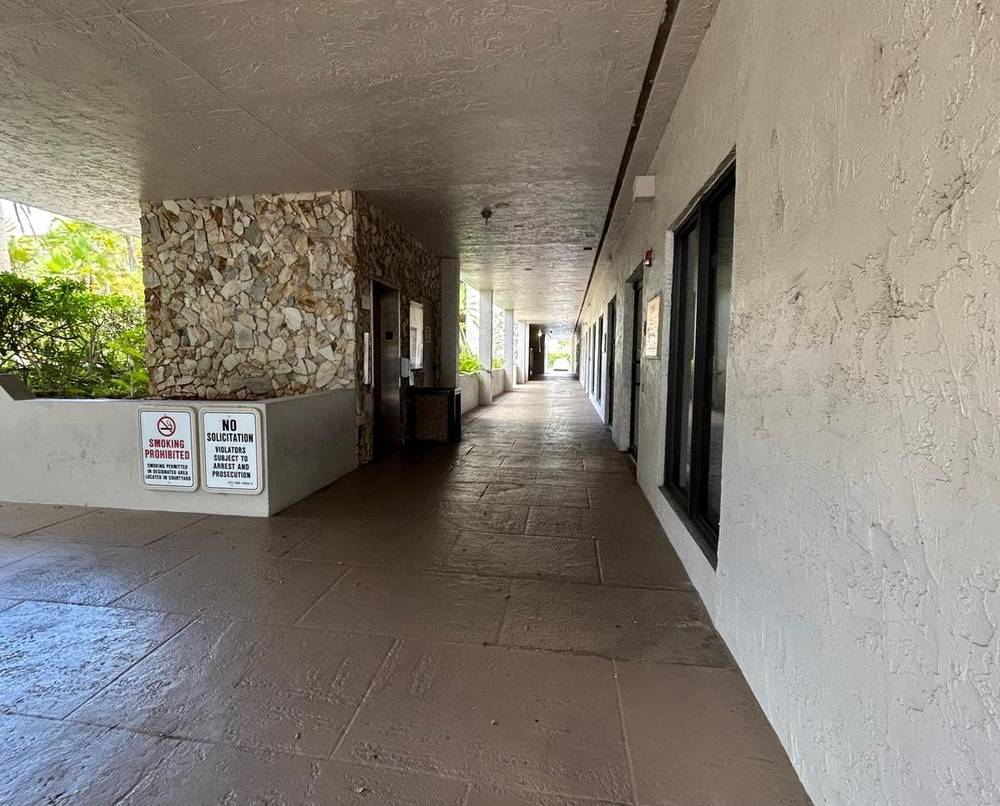 First floor corridor entrance from back parking lot